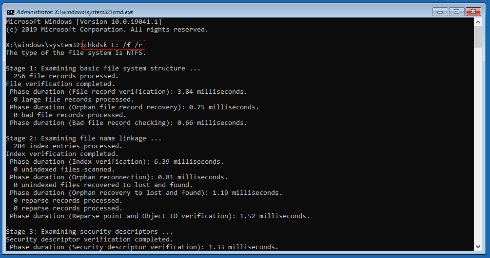 The Command Prompt in WinRE with the CHKDSK commands running.