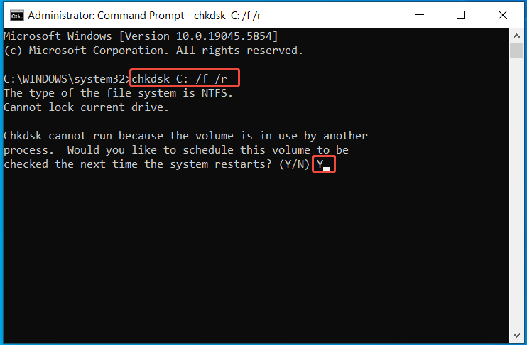 The elevated Command Prompt window with the chkdsk command to fix disk problems.
